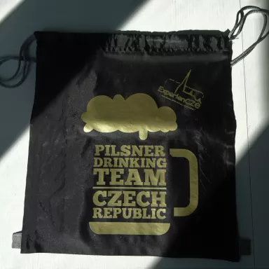 Pilsner Drinking Team Czech Republic: Drawstring Bagpack - BLACK + GOLDEN logo